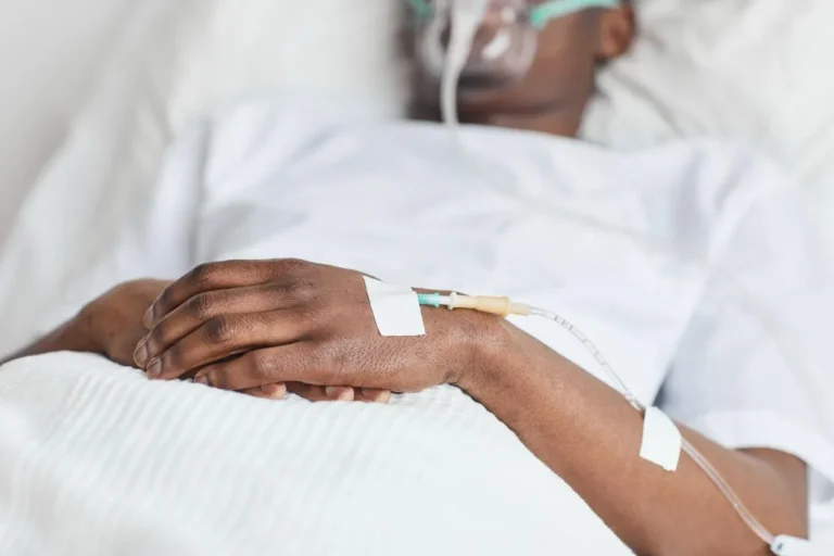 Man suffering from cancer because of alcohol.